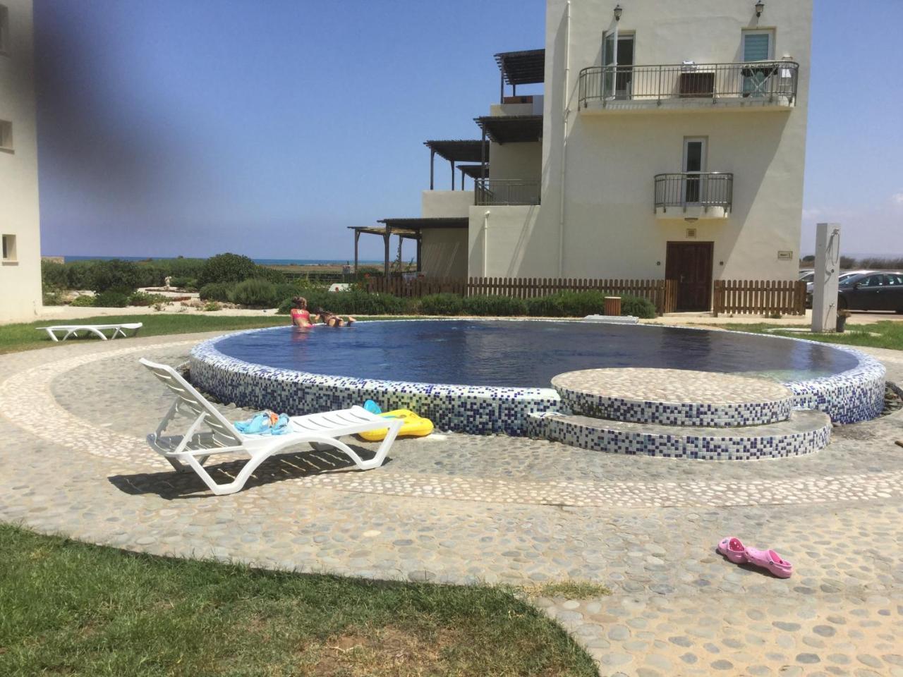 Aphrodite Beachfront Apartment Ghaziveran Esterno foto